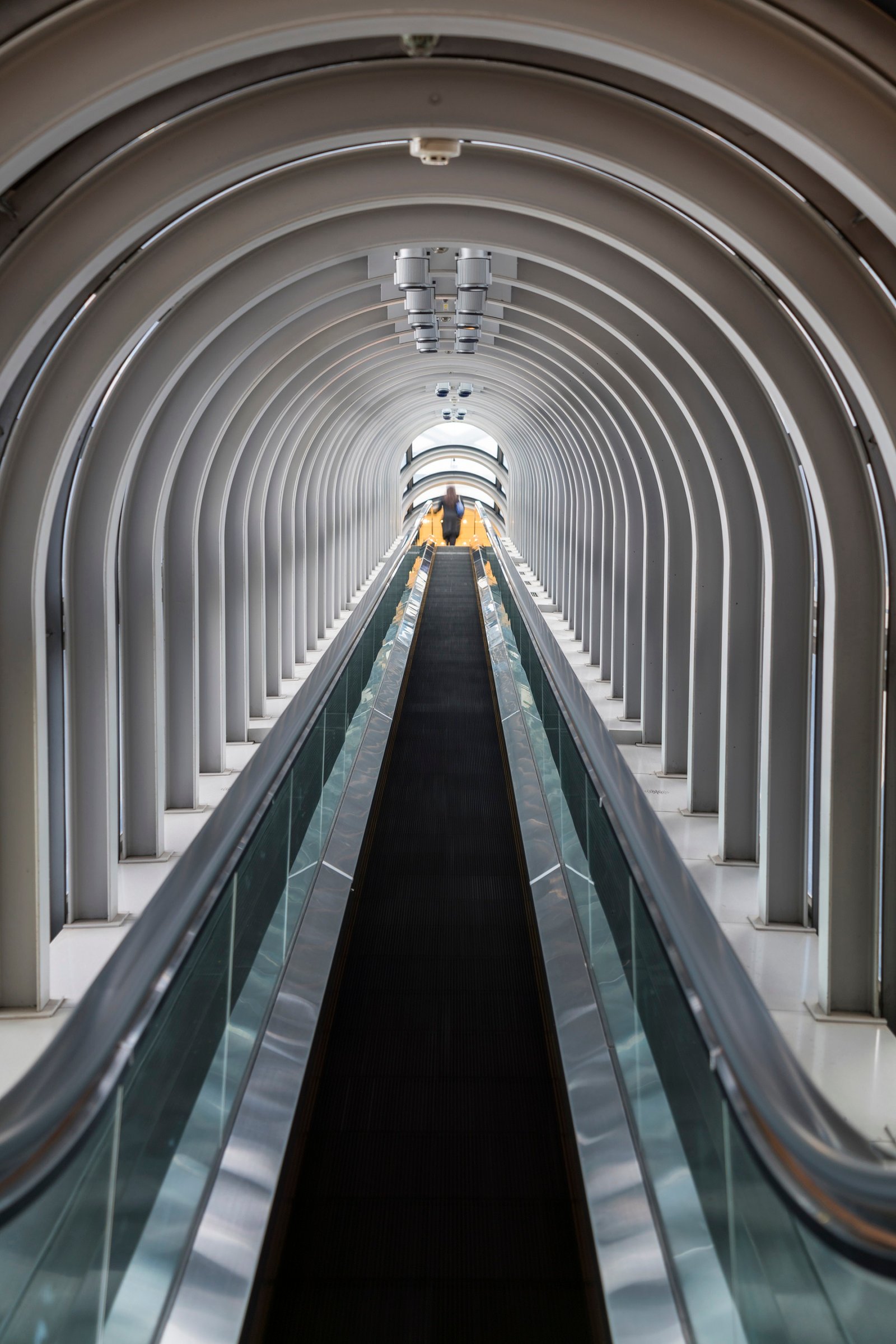 Interior view of contemporary building with escalator
